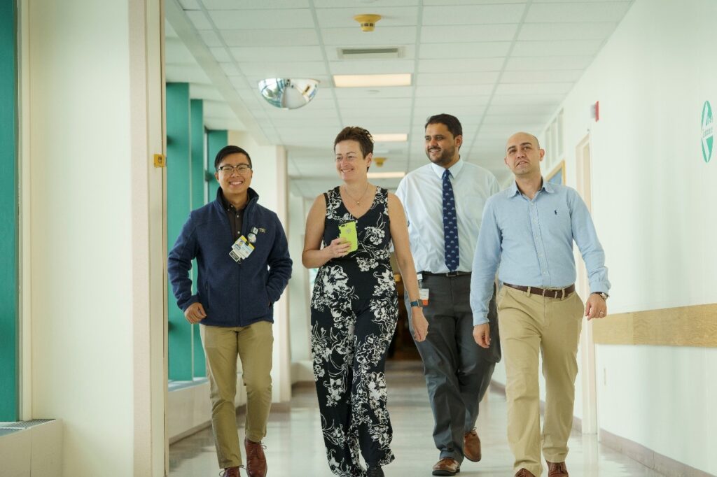 People walk down the hall at Dartmouth Hitchcock Medical Center